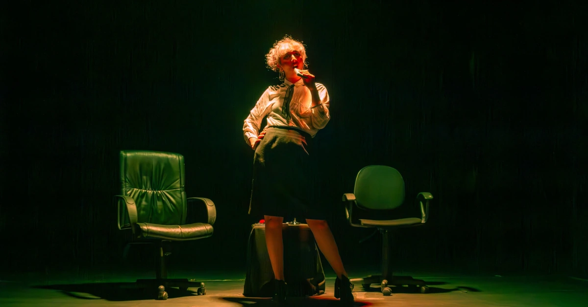 Performer standing under a focused stage spotlight, illustrating how selected affiliate blog posts can receive priority promotion while others use different discovery paths.