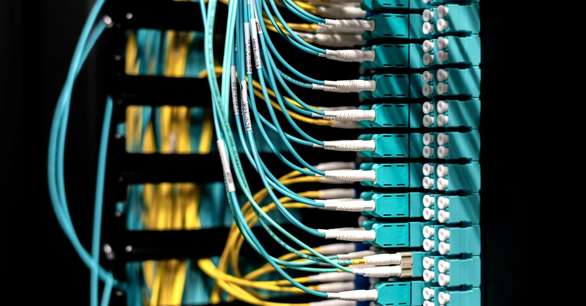 Organized network cables connected to a patch panel, representing a structured affiliate link management system