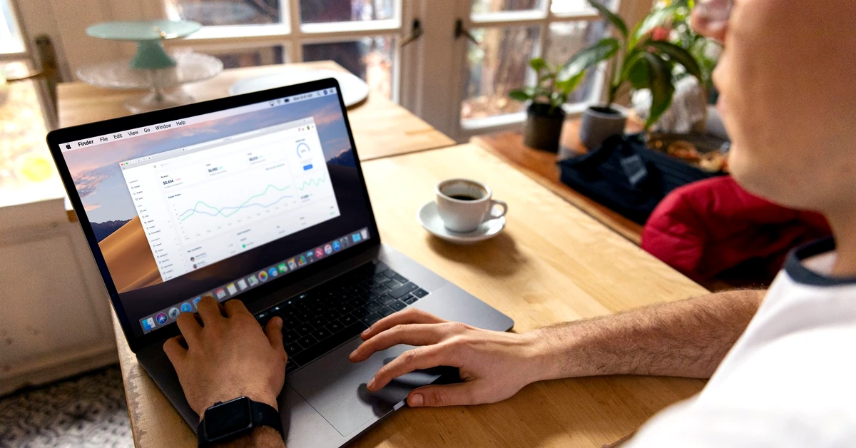 Affiliate marketer reviewing analytics on a laptop to measure engagement and performance across an email welcome sequence