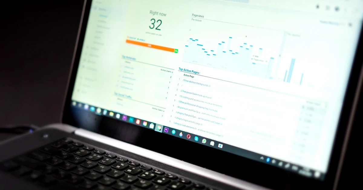 Affiliate marketer reviewing website analytics on a laptop to track traffic, clicks, and campaign performance