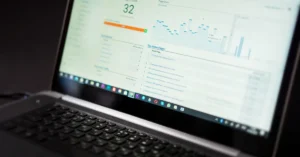 Laptop displaying website traffic analytics used to evaluate a primary traffic source for an affiliate blog.