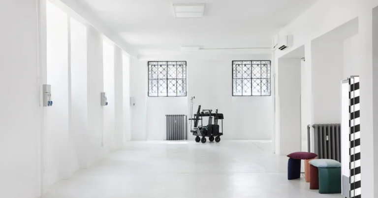 Bright minimalist showroom with open floor space, illustrating a focused environment designed around a specific marketing purpose.