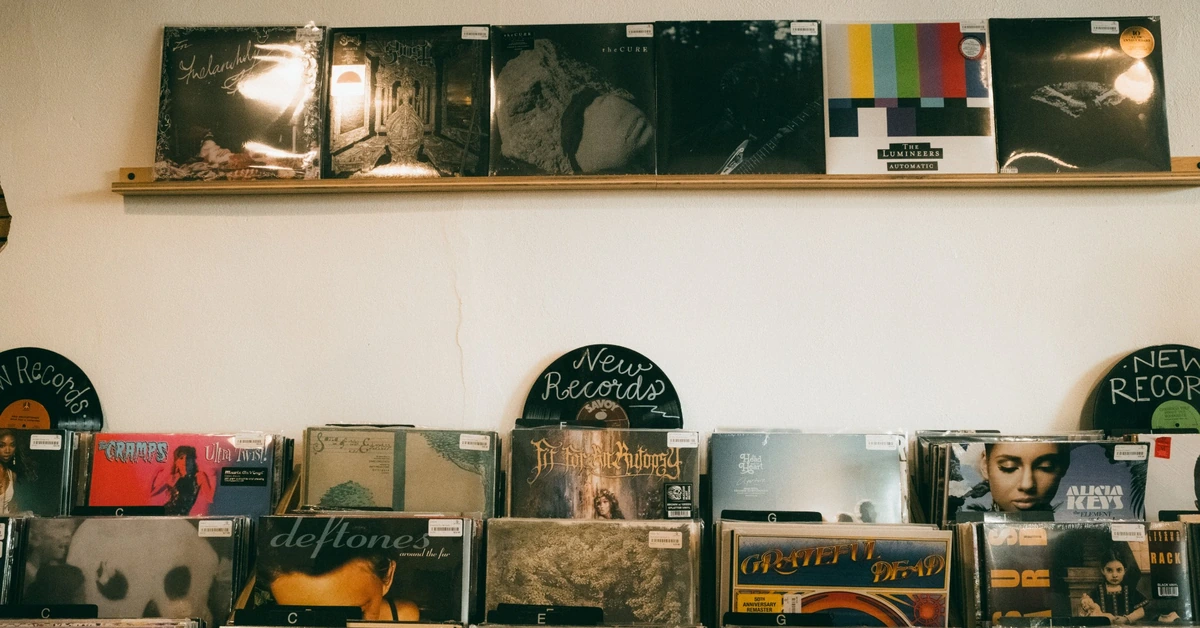 Curated display of vinyl records in a record shop, illustrating why a growing affiliate blog should selectively feature and promote its strongest content.