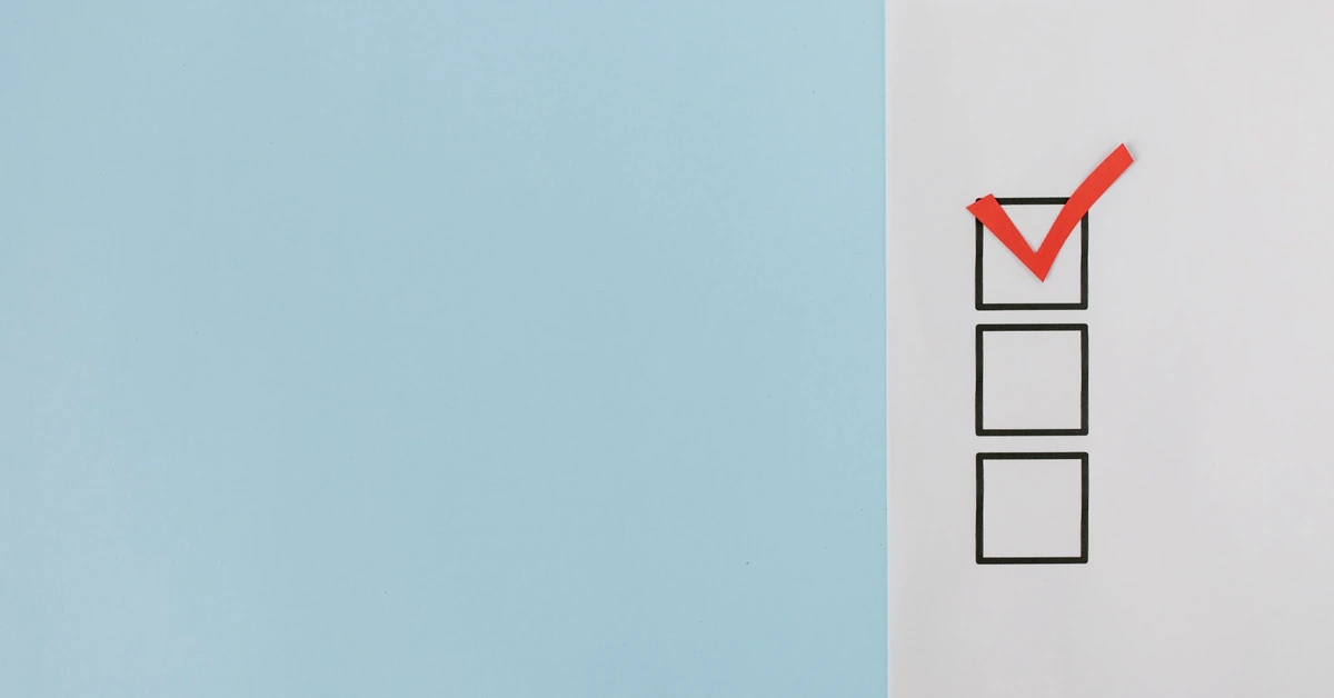 Checklist with a red checkmark representing the evaluation and prioritization of affiliate content opportunities